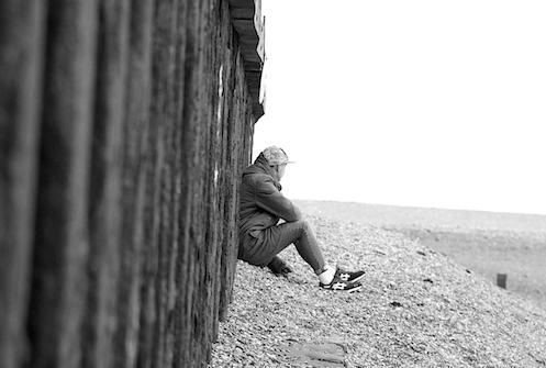 Thoughtful man on beach