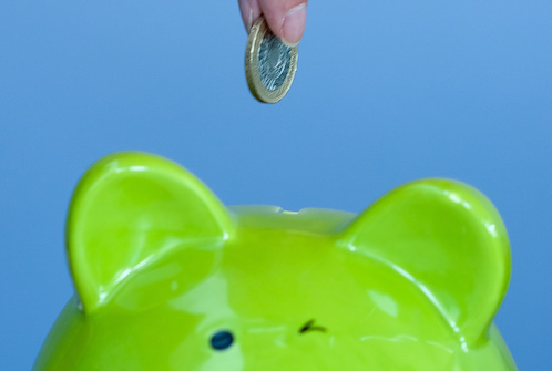 Donate money in a piggy bank