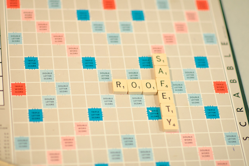 The words roof and safety on a Scrabble board