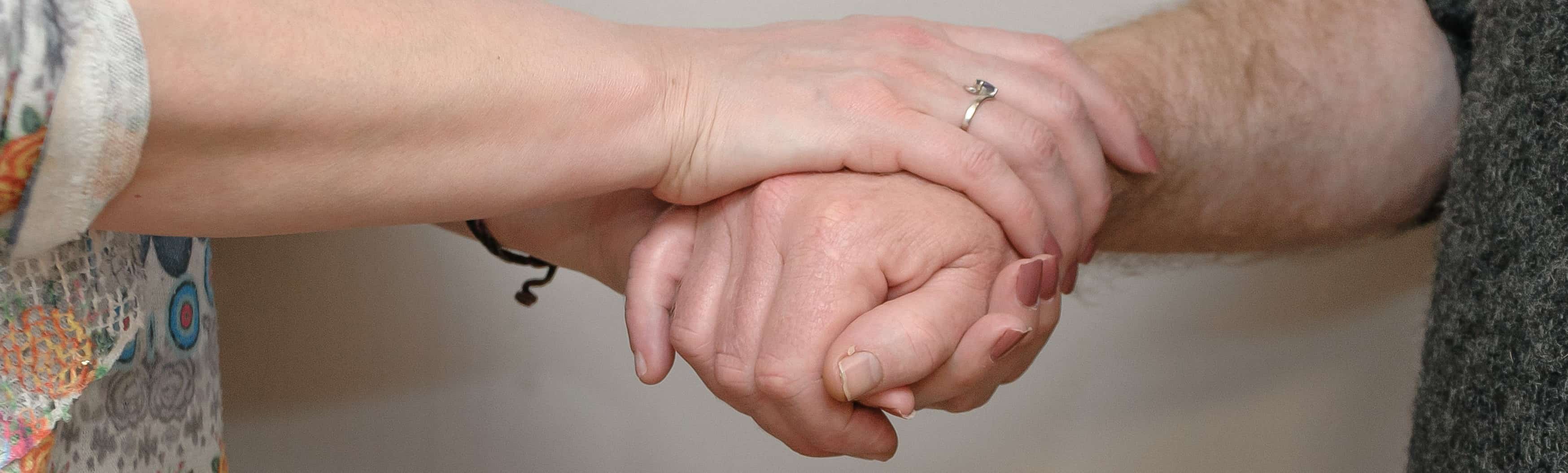 holding supportive hands